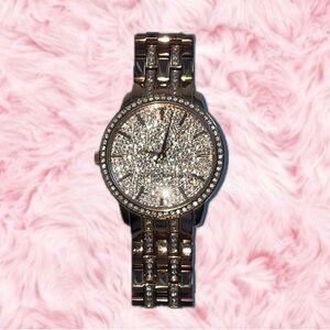 Michael Kors MK-3460 rose gold watch with diamonds.